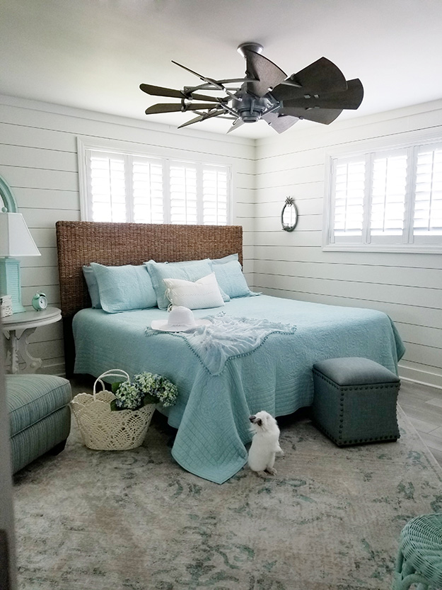 Plantation shutters in a guest bedroom